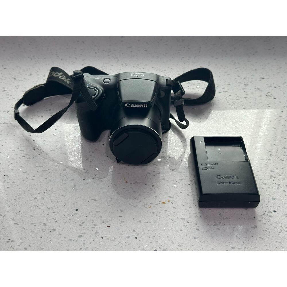 Canon Black Digital Camera with Charger